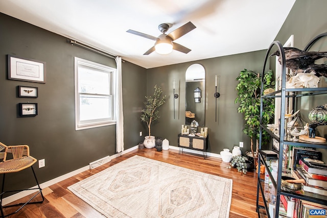 interior space with ceiling fan and light wood-type flooring