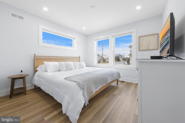 bedroom featuring hardwood / wood-style floors