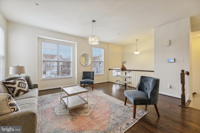 living room with dark wood-type flooring