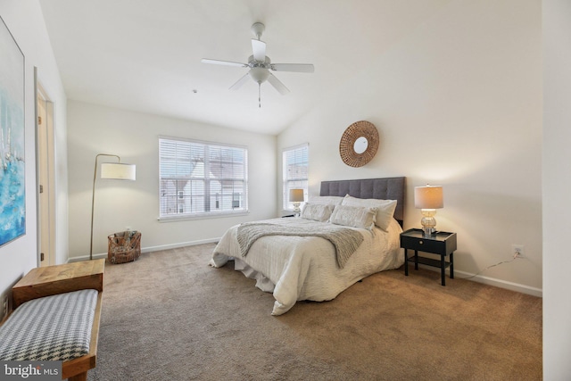 carpeted bedroom featuring lofted ceiling and ceiling fan