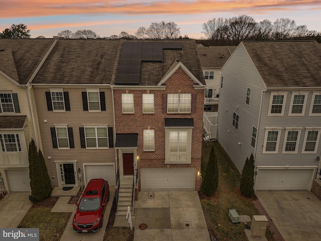 view of property featuring solar panels