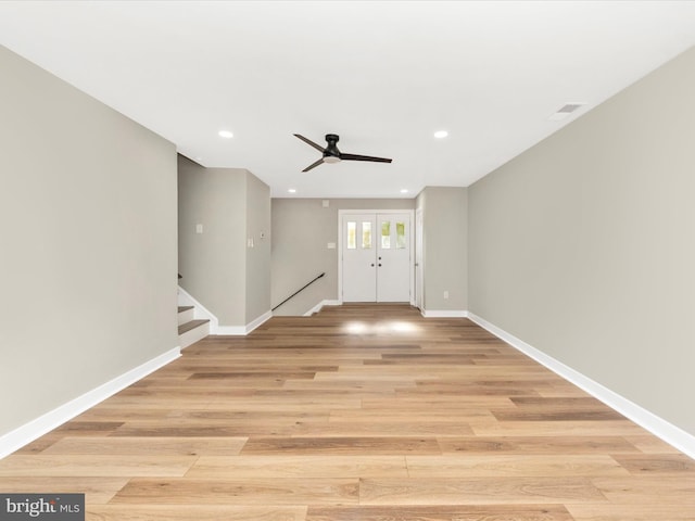 entrance foyer featuring ceiling fan and light hardwood / wood-style flooring