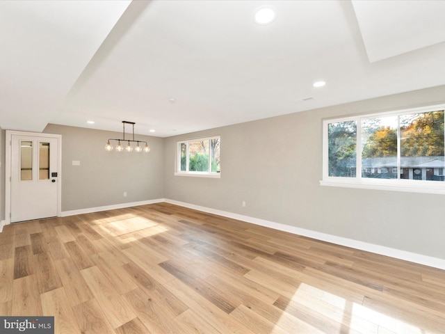 unfurnished living room featuring light hardwood / wood-style floors