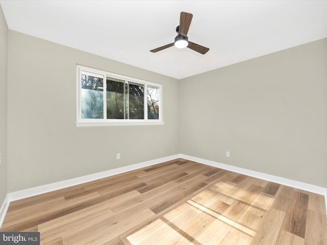 empty room featuring light hardwood / wood-style flooring and ceiling fan