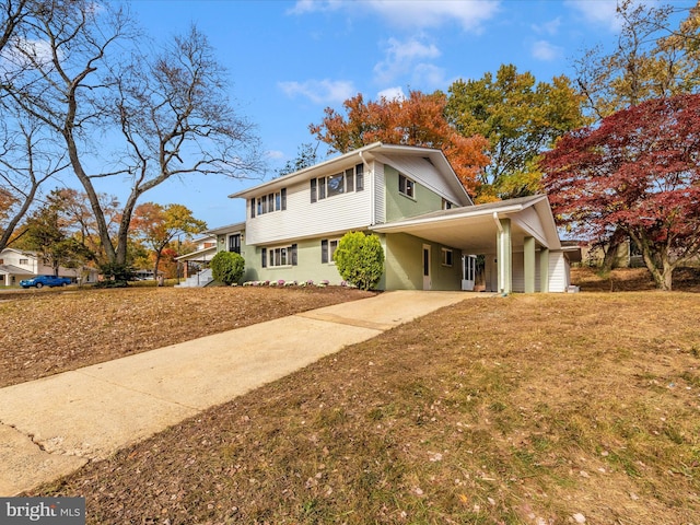 front facade with a carport