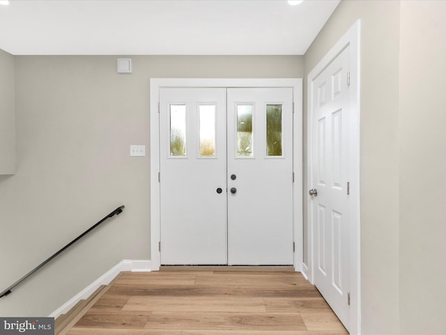 foyer entrance featuring light hardwood / wood-style floors