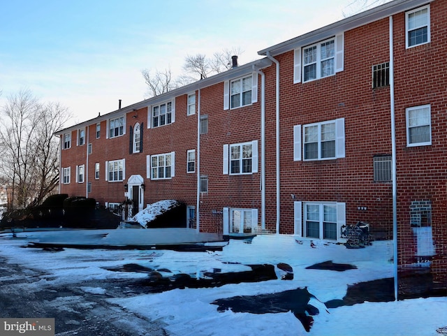 view of snow covered property