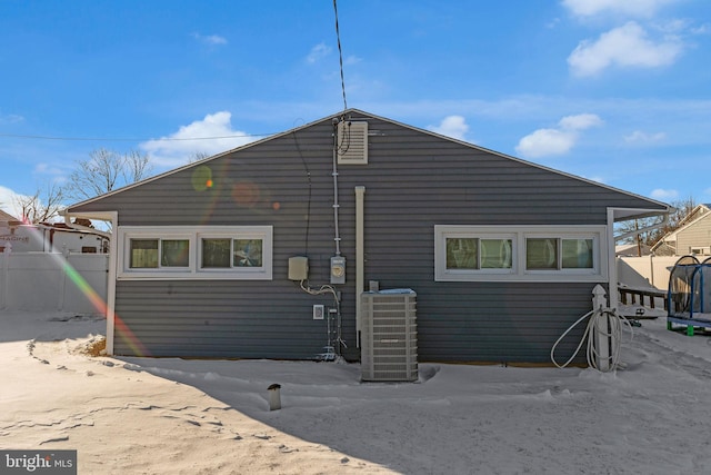 back of property with central air condition unit