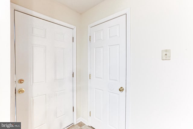 interior space featuring light tile patterned floors