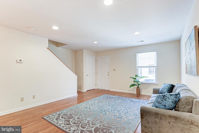 sitting room with hardwood / wood-style floors