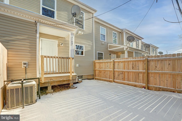 wooden deck with central AC unit