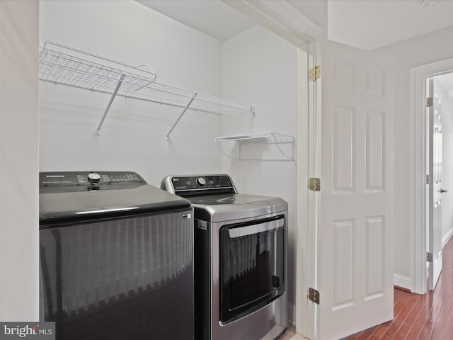 washroom with washing machine and dryer