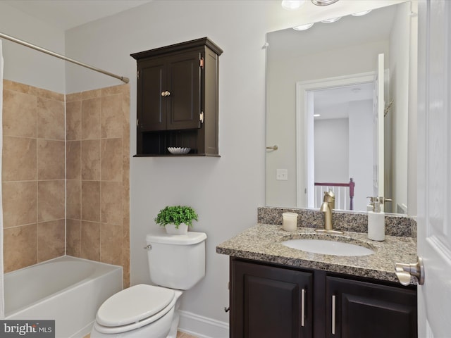 full bathroom with toilet, shower / bathing tub combination, and vanity