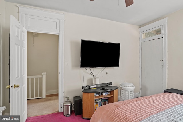 carpeted bedroom featuring ceiling fan