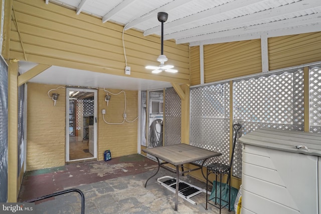 view of patio featuring ceiling fan and washer / clothes dryer