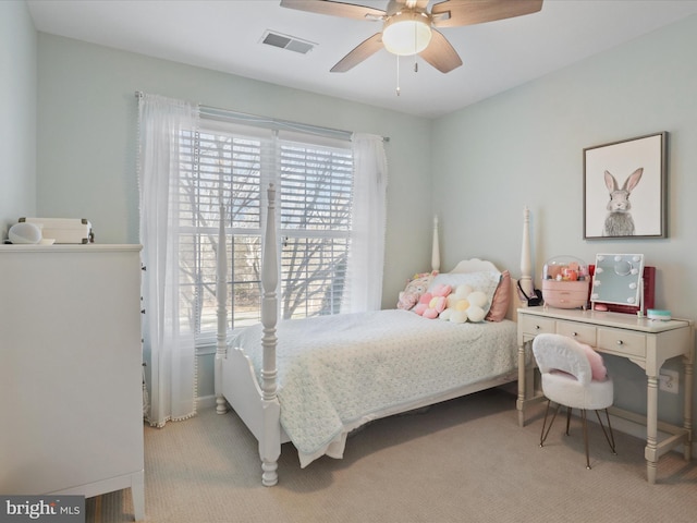 carpeted bedroom with ceiling fan