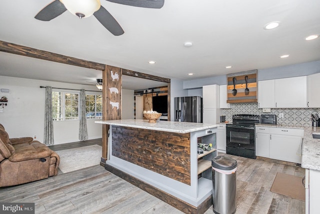 kitchen with white cabinetry, backsplash, stainless steel fridge with ice dispenser, electric range, and light hardwood / wood-style flooring