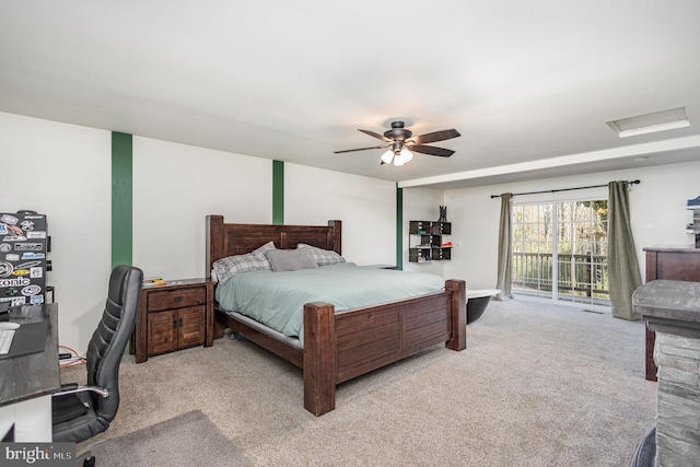 carpeted bedroom with ceiling fan and access to exterior