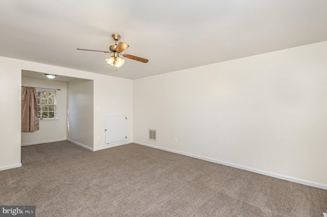 carpeted empty room with ceiling fan