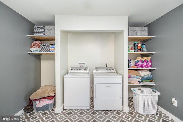 laundry room featuring washing machine and dryer