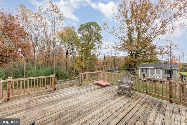 wooden deck with an outdoor structure