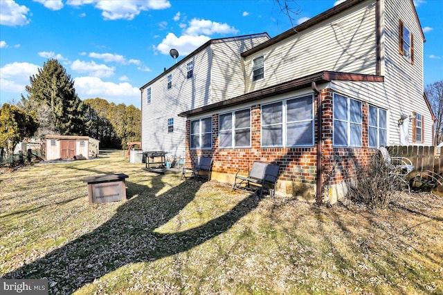 view of property exterior with a shed and a lawn