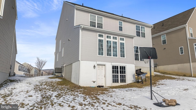 view of snow covered property