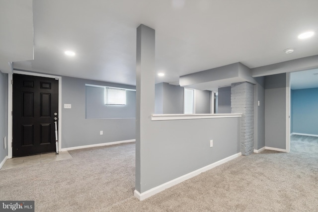 basement with light carpet