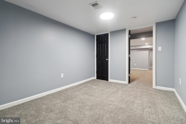 unfurnished bedroom with light colored carpet