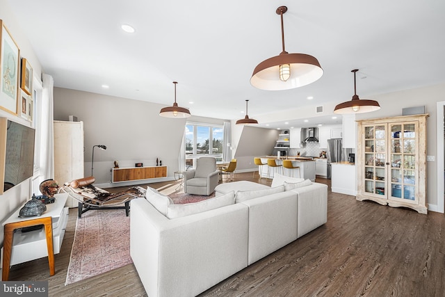 living room featuring dark wood-type flooring