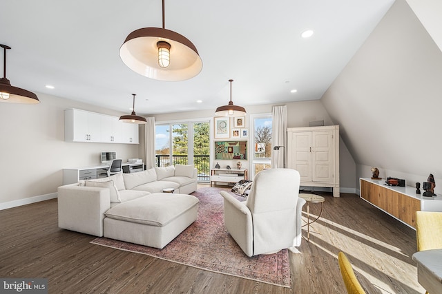 living room featuring lofted ceiling and dark hardwood / wood-style floors