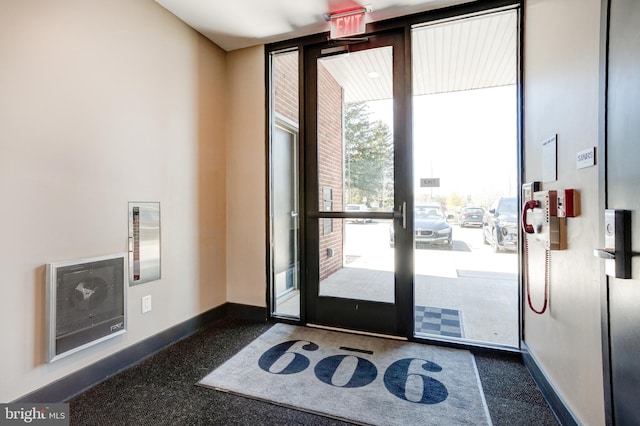 doorway to outside with ac unit and french doors