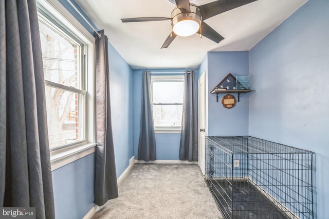 interior space featuring light colored carpet