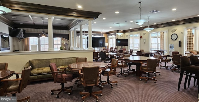 dining space featuring a wealth of natural light, visible vents, ornamental molding, and ornate columns