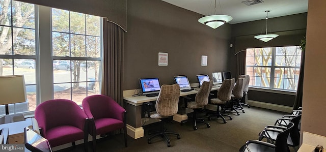 office featuring carpet, visible vents, and baseboards