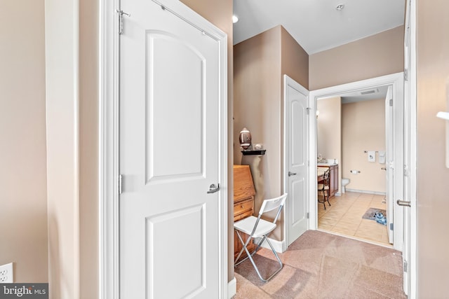 bathroom with tile patterned flooring