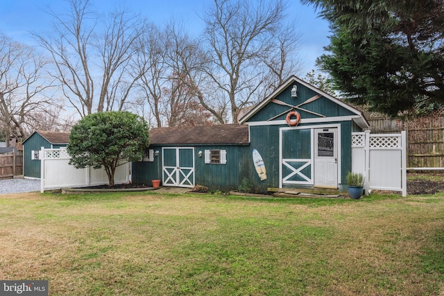 view of outdoor structure with a lawn