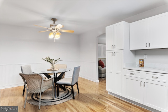 dining room featuring ceiling fan and light hardwood / wood-style flooring