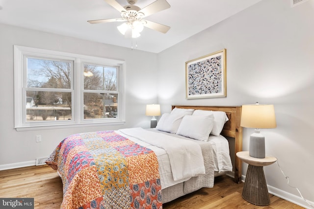 bedroom featuring ceiling fan and light wood-type flooring