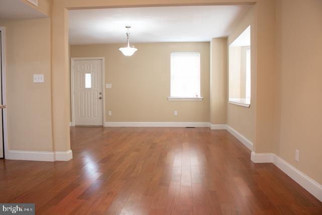 foyer with hardwood / wood-style floors