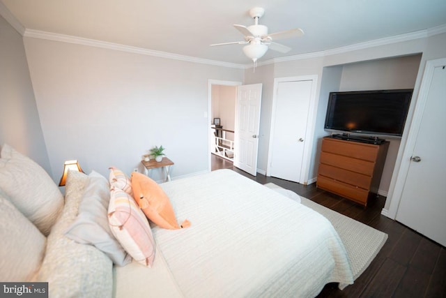 bedroom with ceiling fan, dark wood-type flooring, and ornamental molding