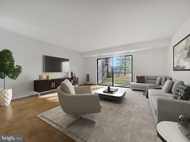 living room with parquet flooring