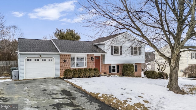 tri-level home featuring a garage