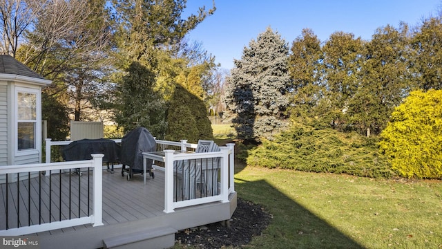 wooden deck with a yard