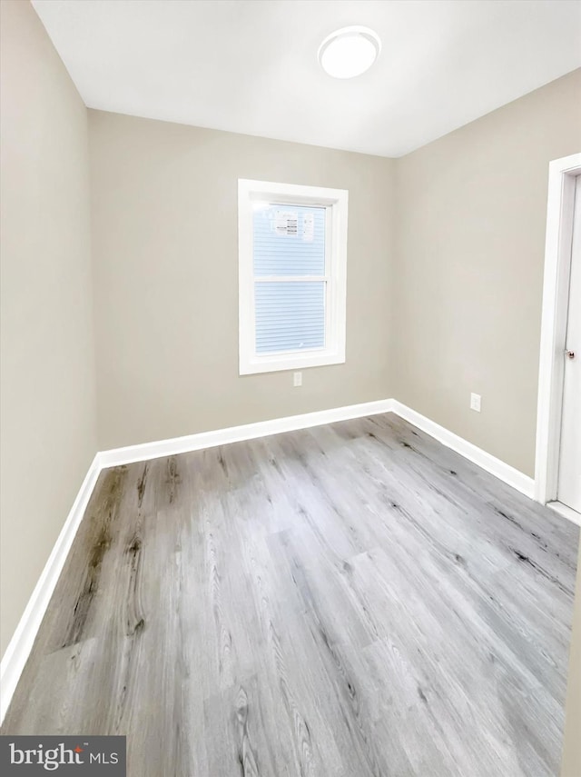 empty room with light wood-type flooring