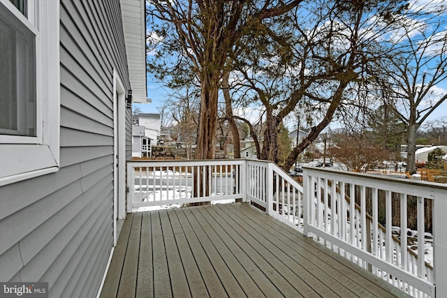 view of snow covered deck