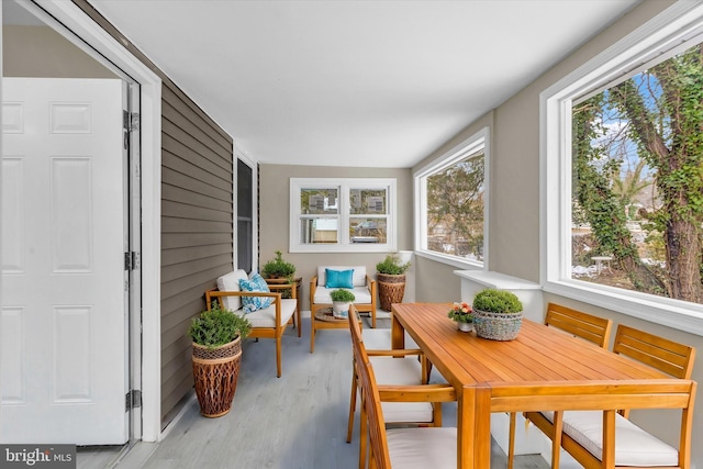 sunroom with plenty of natural light