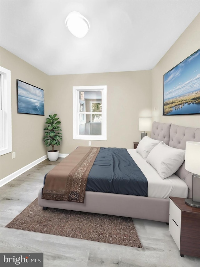 bedroom featuring light wood-type flooring