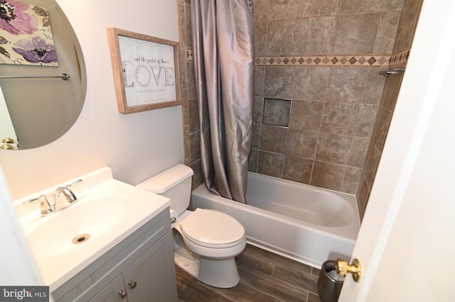 full bathroom with toilet, shower / bathtub combination with curtain, wood-type flooring, and vanity