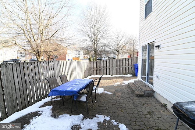 view of snow covered patio